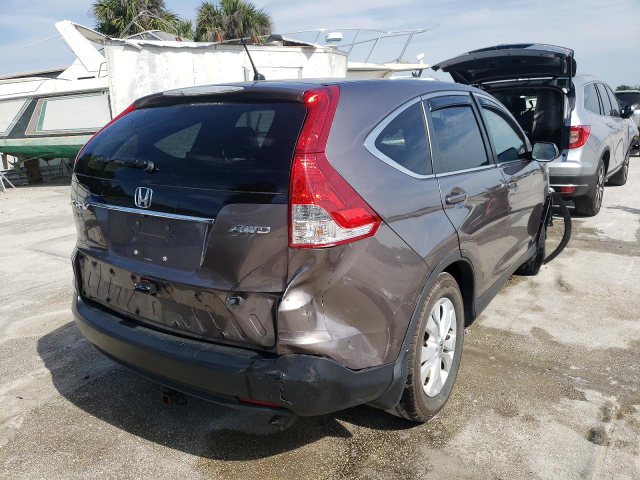 Photo 4 from auction – 2014 HONDA CR-V EX with VIN 5J6RM4H52EL079965