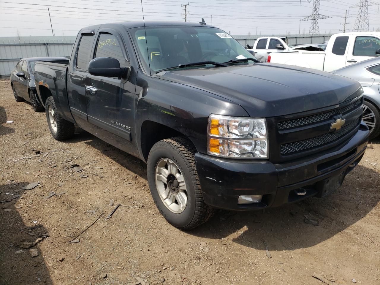 CHEVROLET SILVERADO 2011 with VIN 1GCRKTE32BZ186595 - Photo from auction