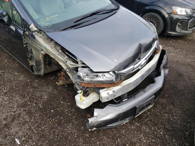 Photo 9 from auction – 2012 HONDA CIVIC LX with VIN 2HGFB2F43CH104252