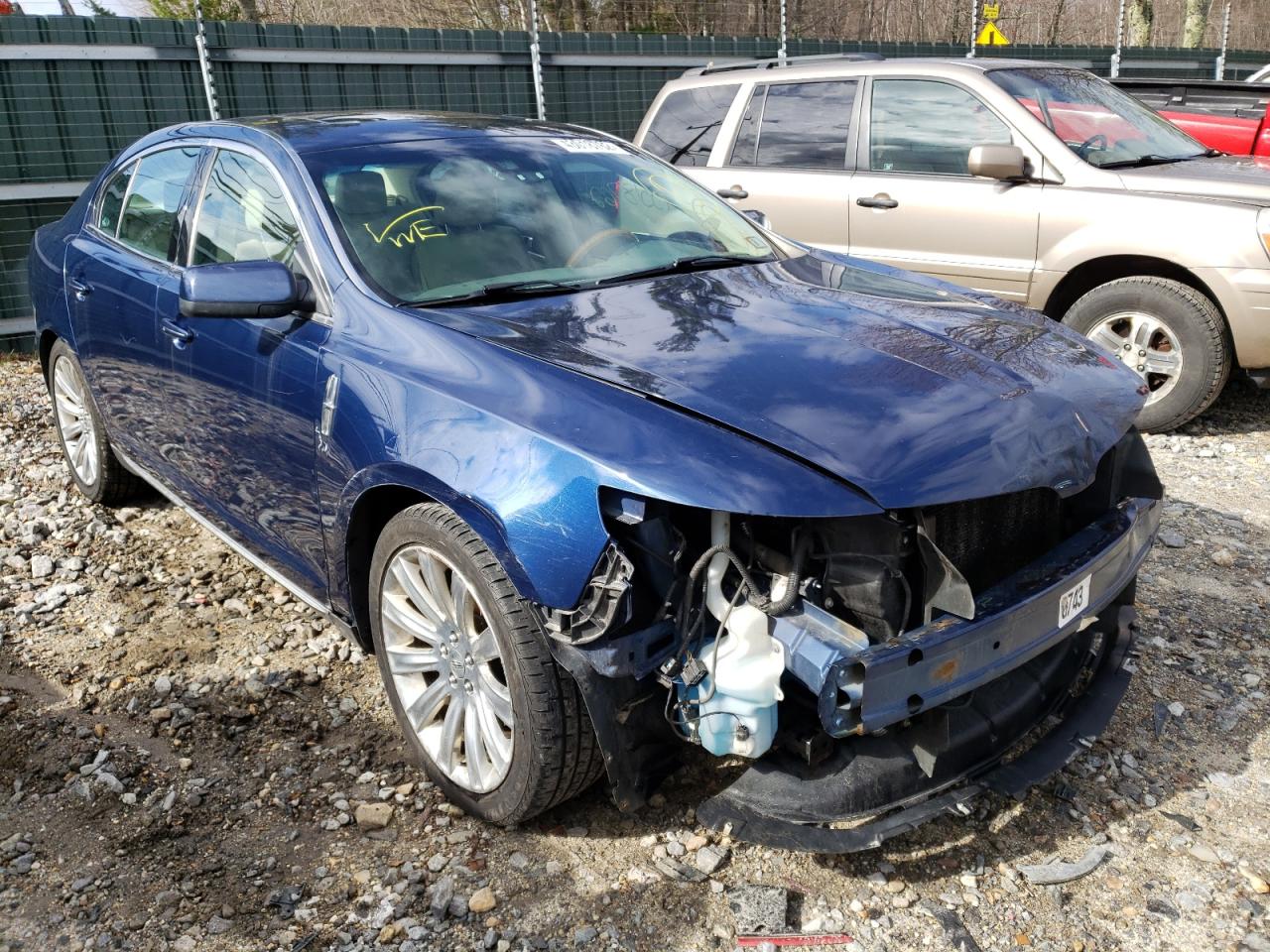 LINCOLN MKS 2012 with VIN 1LNHL9ER1CG806524 - Photo from auction
