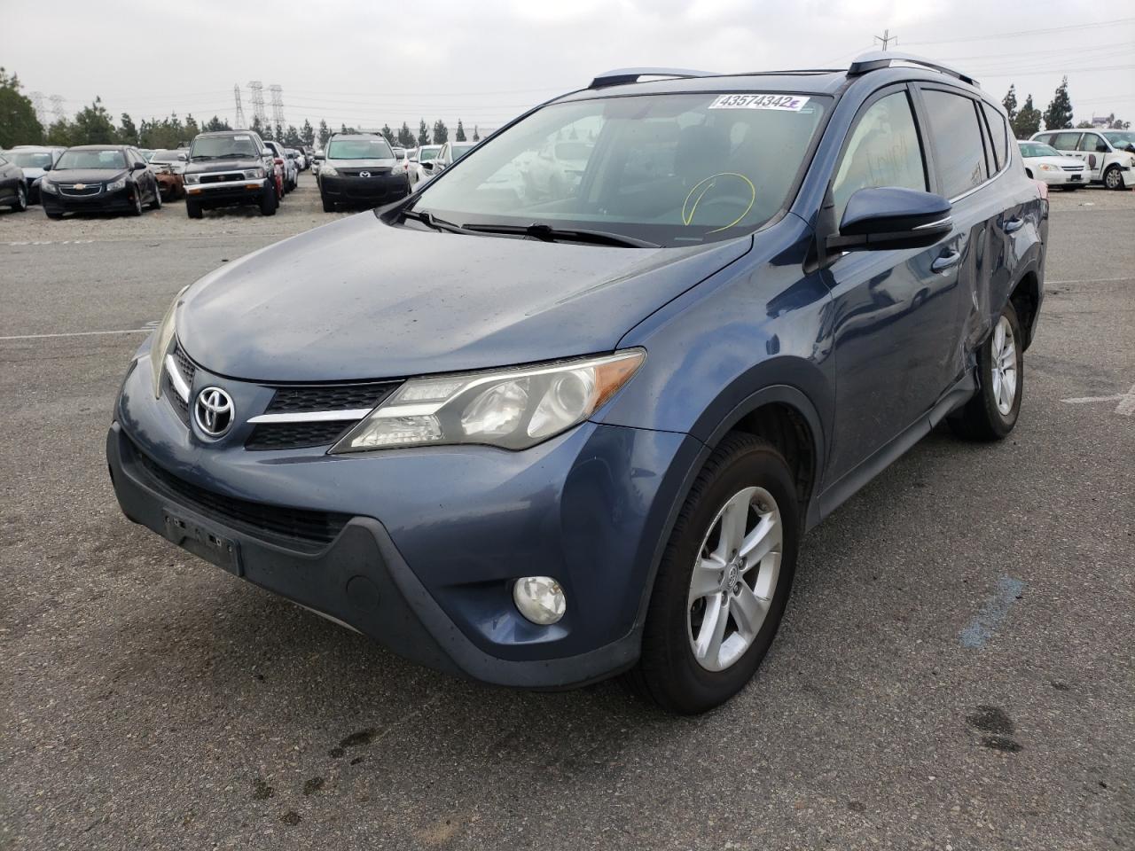 Photo 2 from auction – 2014 TOYOTA RAV4 XLE with VIN JTMRFREV2ED088726