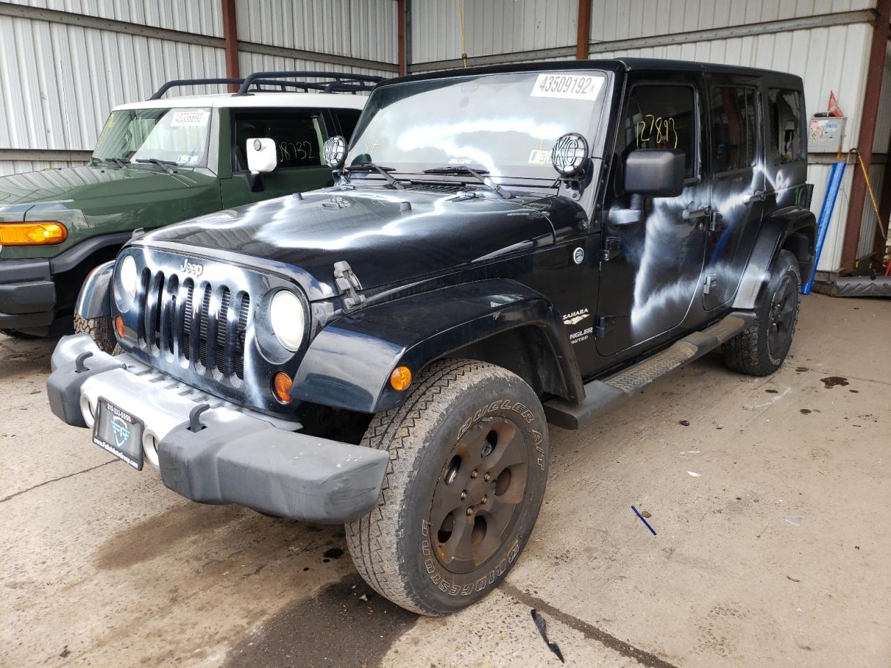 Photo 2 from auction – 2012 JEEP WRANGLER U with VIN 1C4BJWEG9CL279062