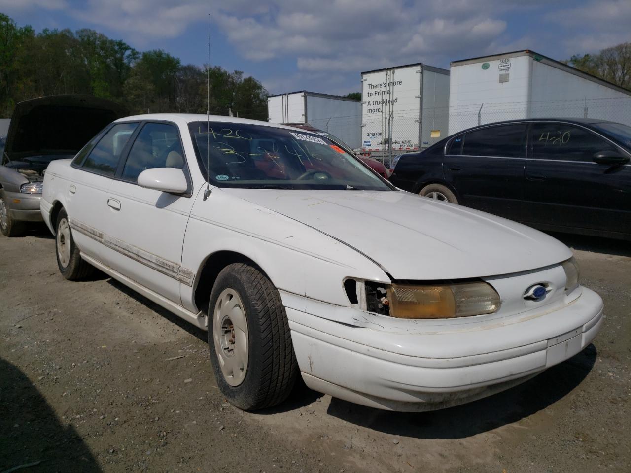 FORD TAURUS GL 1994 with VIN 1FALP52U7RG259973 - Photo from auction