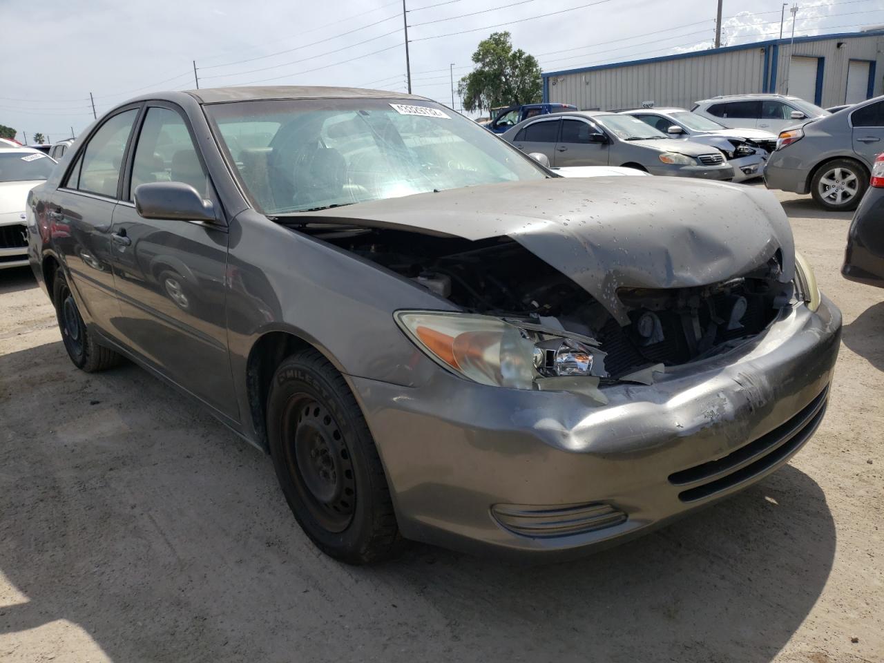 TOYOTA CAMRY LE 2004 with VIN 4T1BE32K44U883315 - Photo from auction