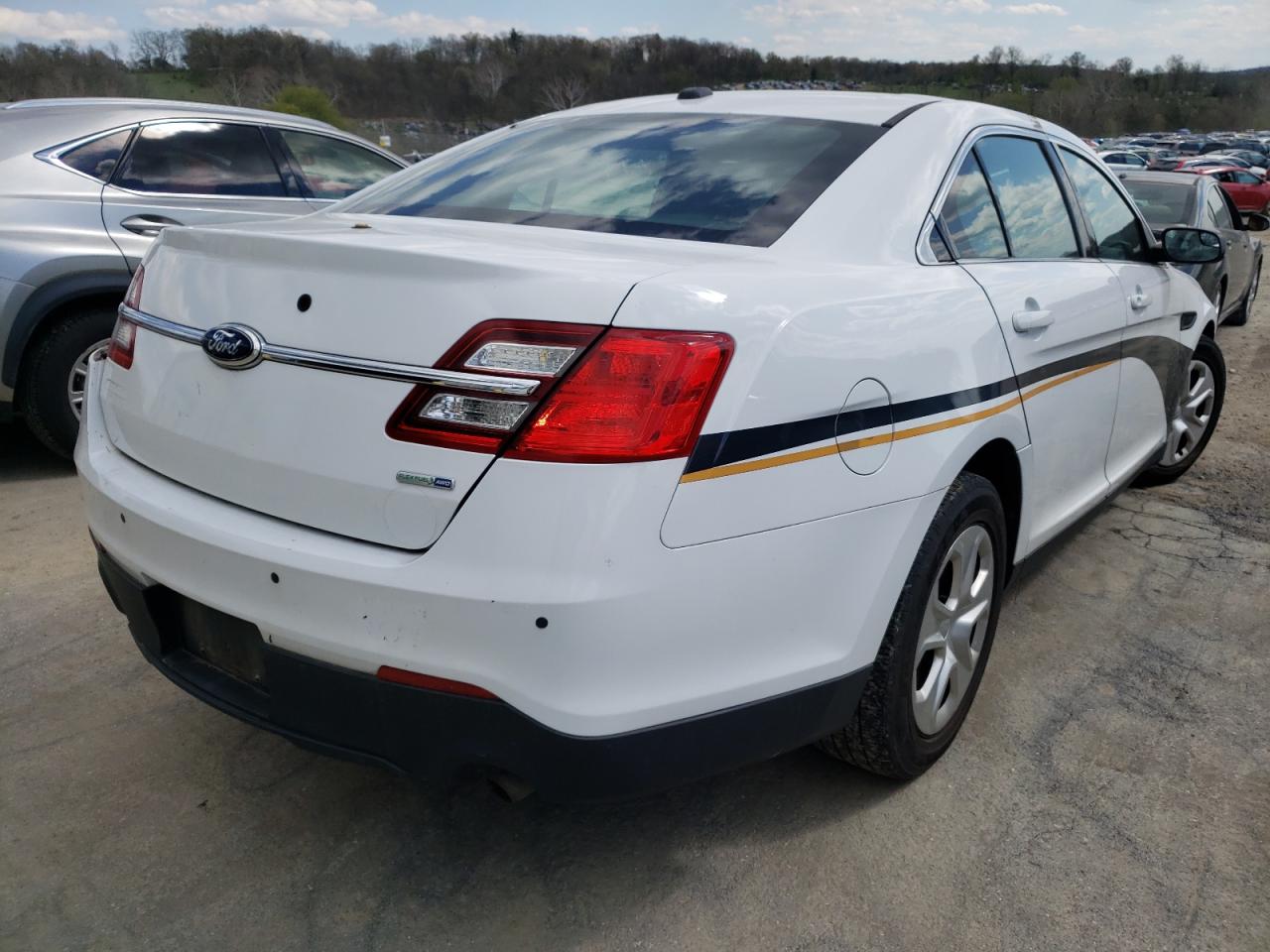 Photo 4 from auction – 2014 FORD TAURUS POL with VIN 1FAHP2MKXEG125985