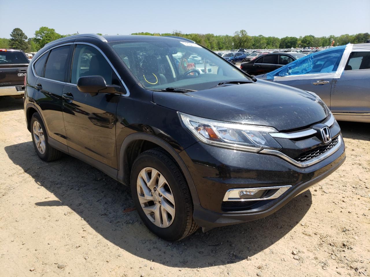 Photo 1 from auction – 2016 HONDA CR-V EXL with VIN 2HKRM3H71GH530733