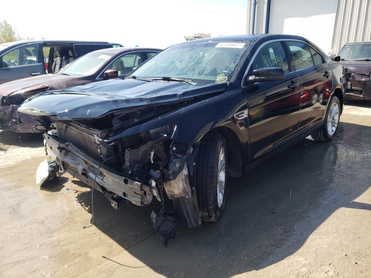 Photo 2 from auction – 2014 FORD TAURUS SEL with VIN 1FAHP2E80EG119549