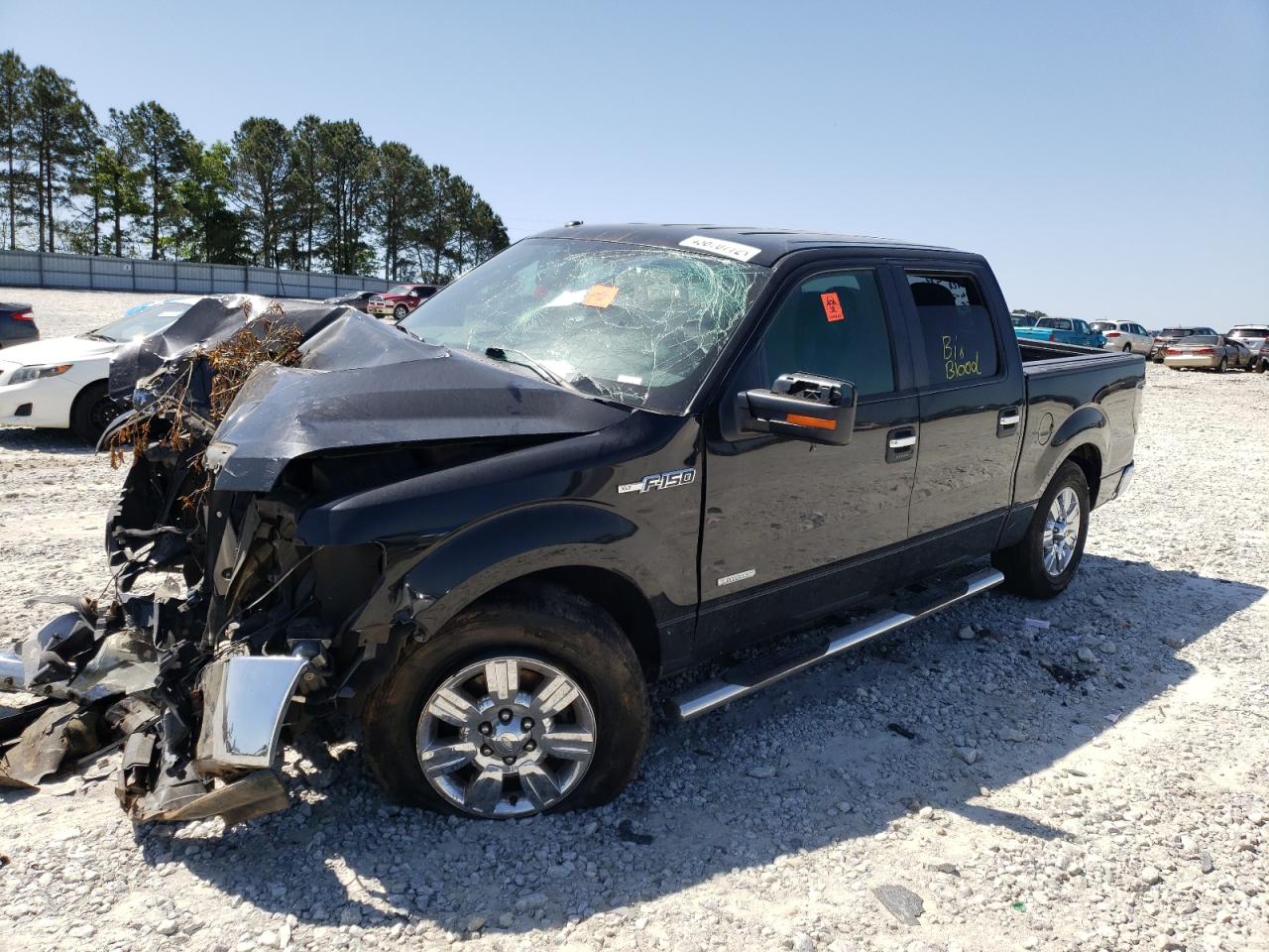 Photo 2 from auction – 2011 FORD F150 SUPER with VIN 1FTFW1CT0BKE01897
