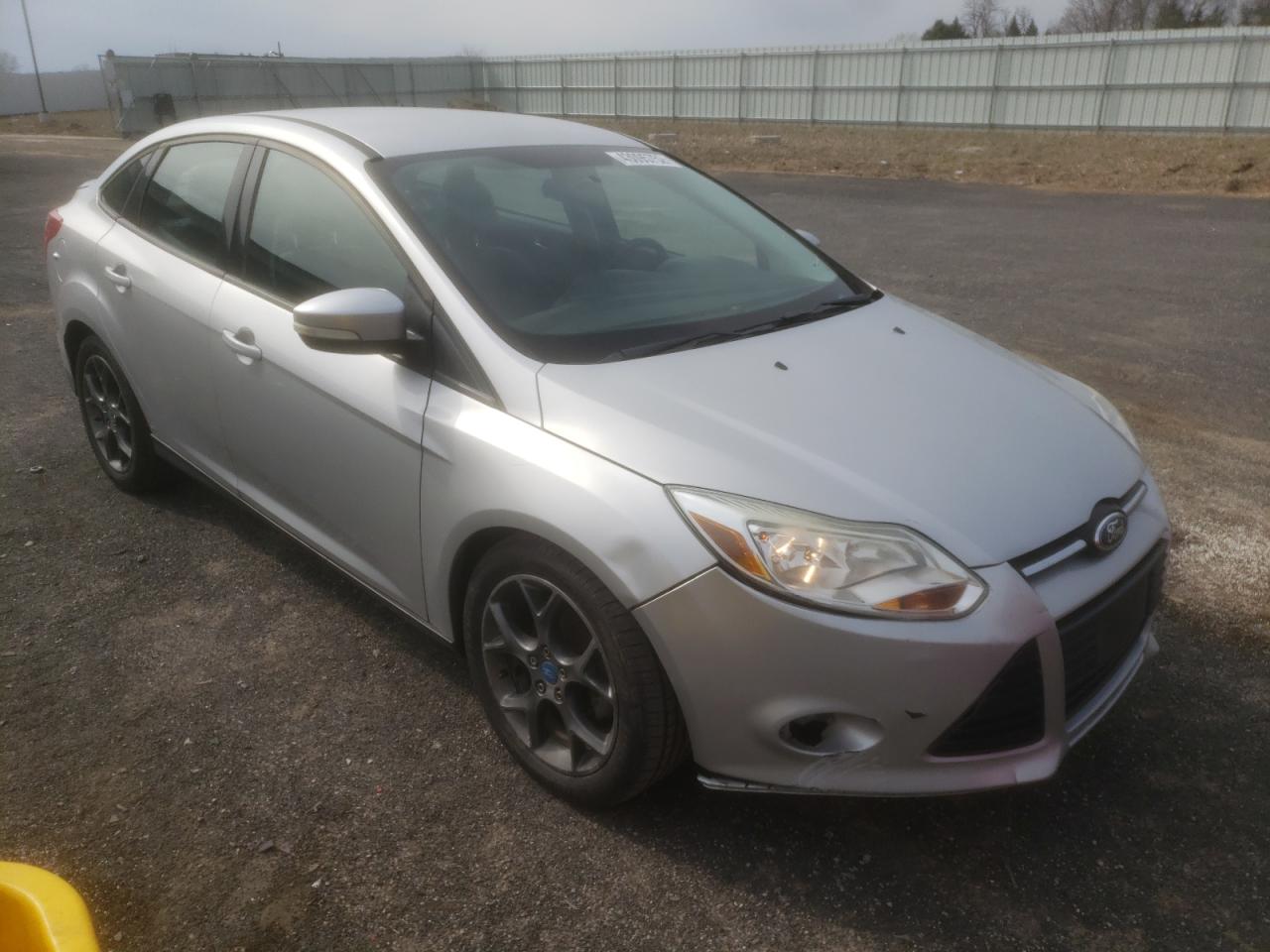 FORD FOCUS SE 2013 with VIN 1FADP3F20DL265373 - Photo from auction