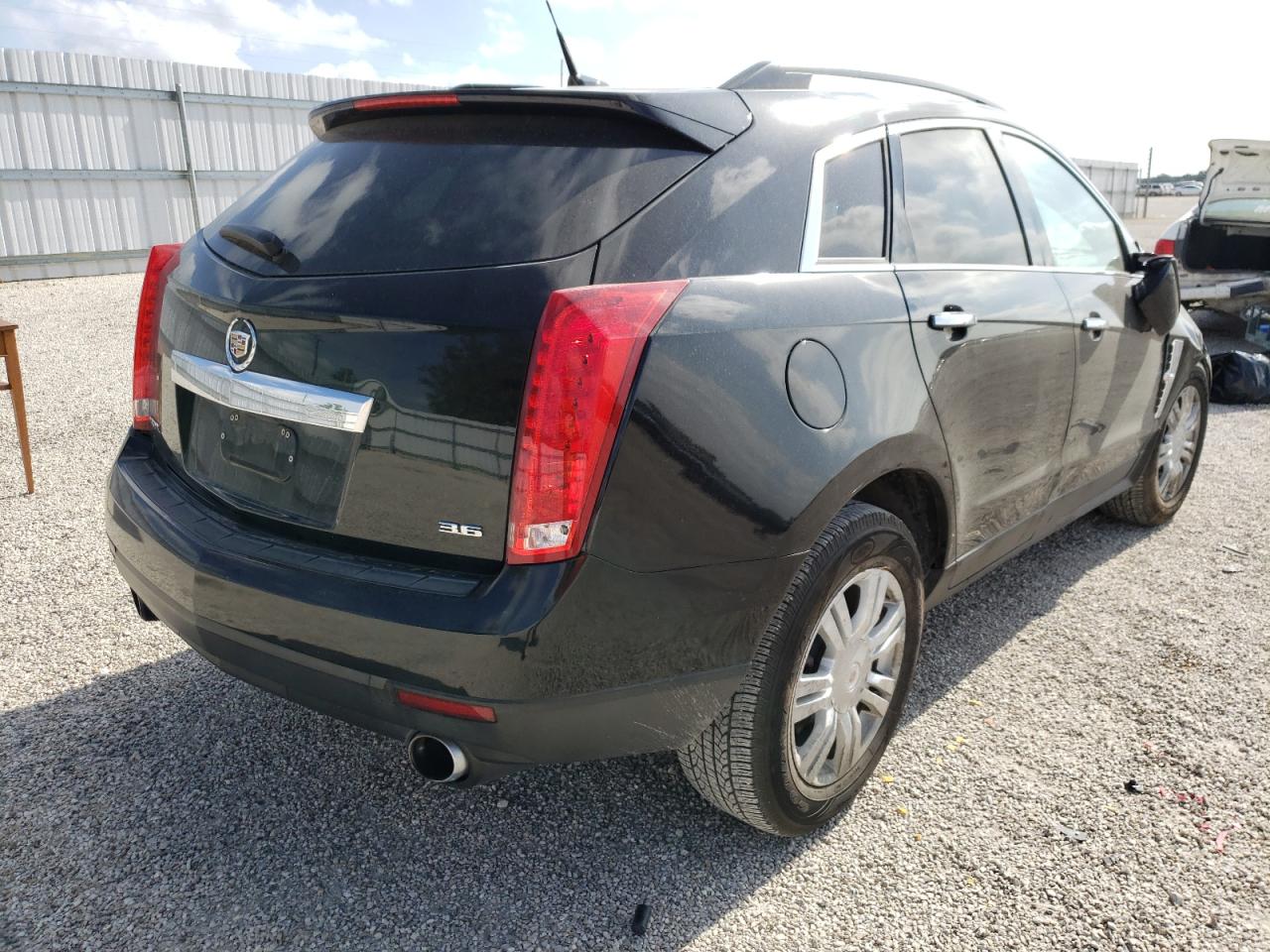 Photo 4 from auction – 2012 CADILLAC SRX with VIN 3GYFNGE35CS544170