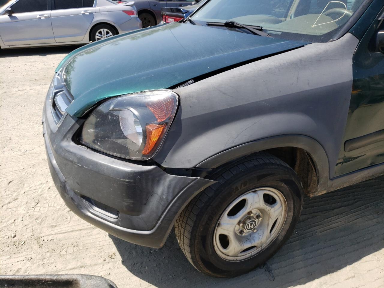 Photo 9 from auction – 2004 HONDA CR-V LX with VIN SHSRD68424U206569