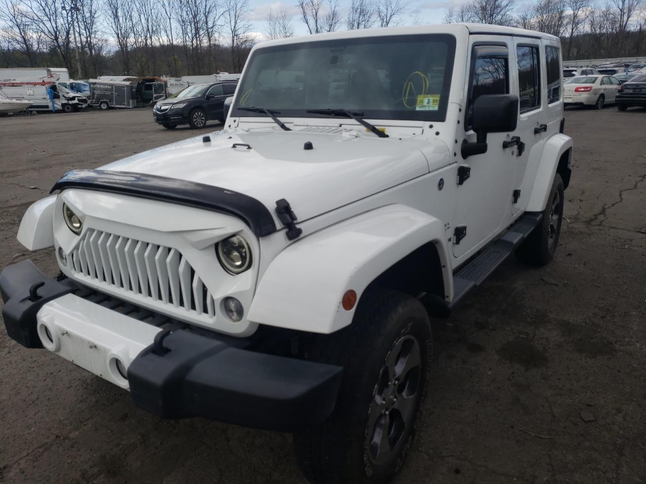 Photo 2 from auction – 2016 JEEP WRANGLER U with VIN 1C4HJWEG8GL148057