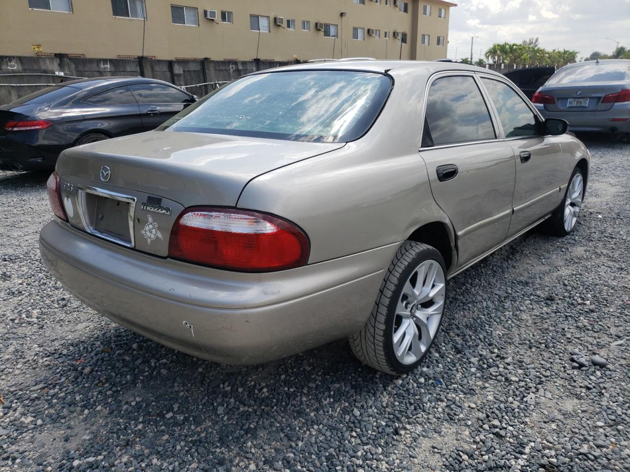 Photo 4 from auction – 2002 MAZDA 626 LX with VIN 1YVGF22C125263291