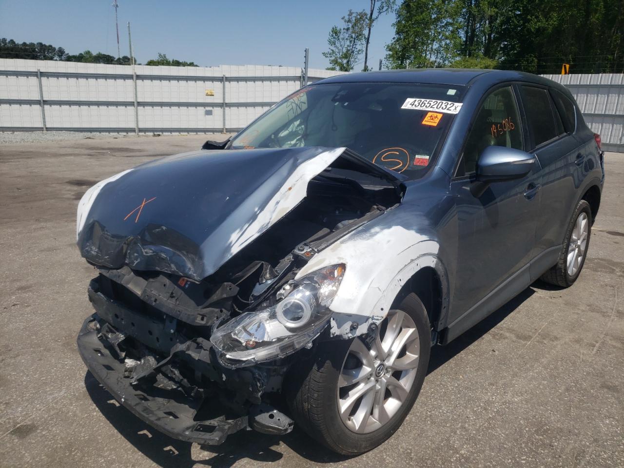Photo 2 from auction – 2015 MAZDA CX-5 GT with VIN JM3KE4DY4F0506948