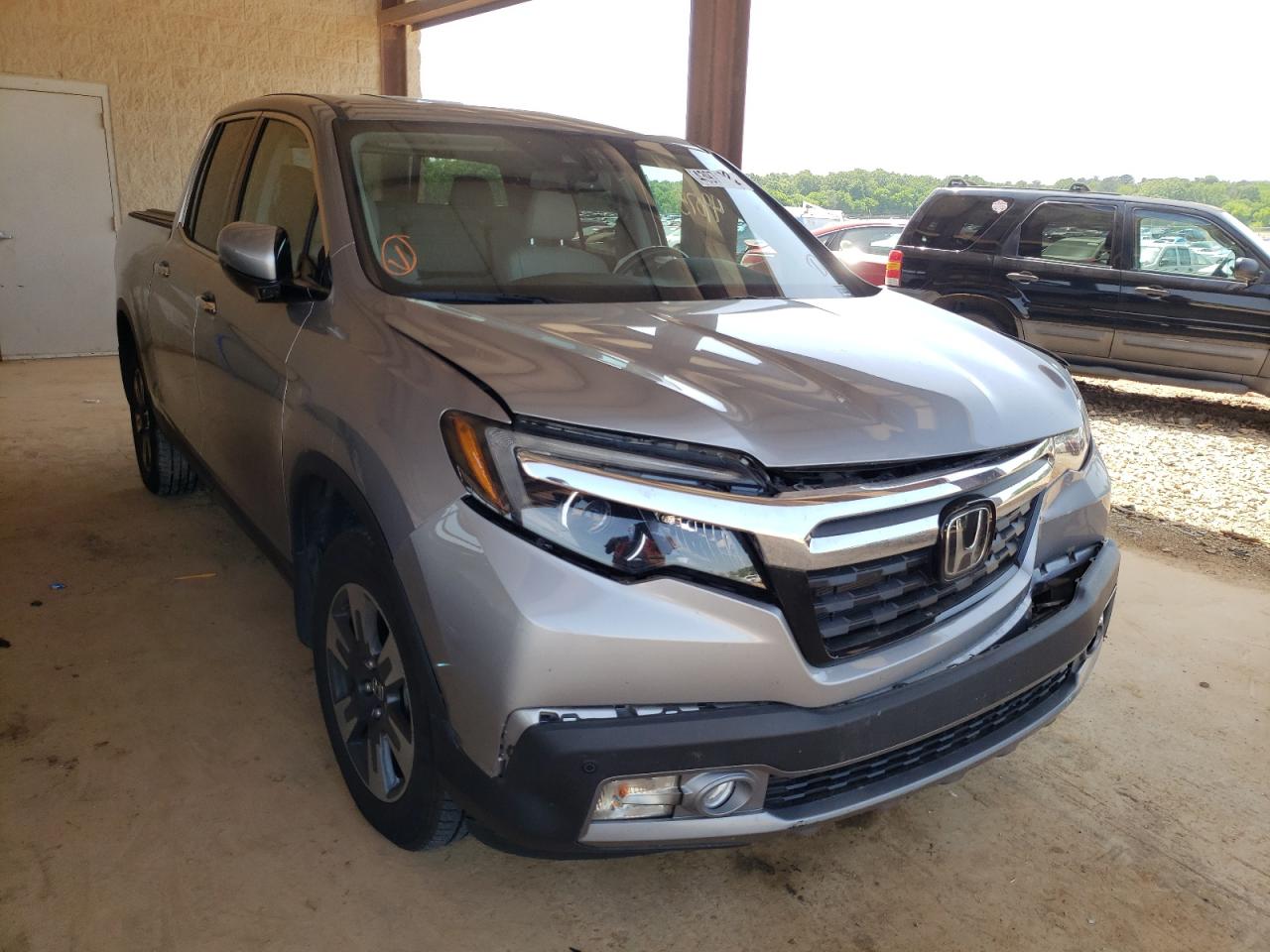 HONDA RIDGELINE 2019 with VIN 5FPYK3F76KB019635 - Photo from auction