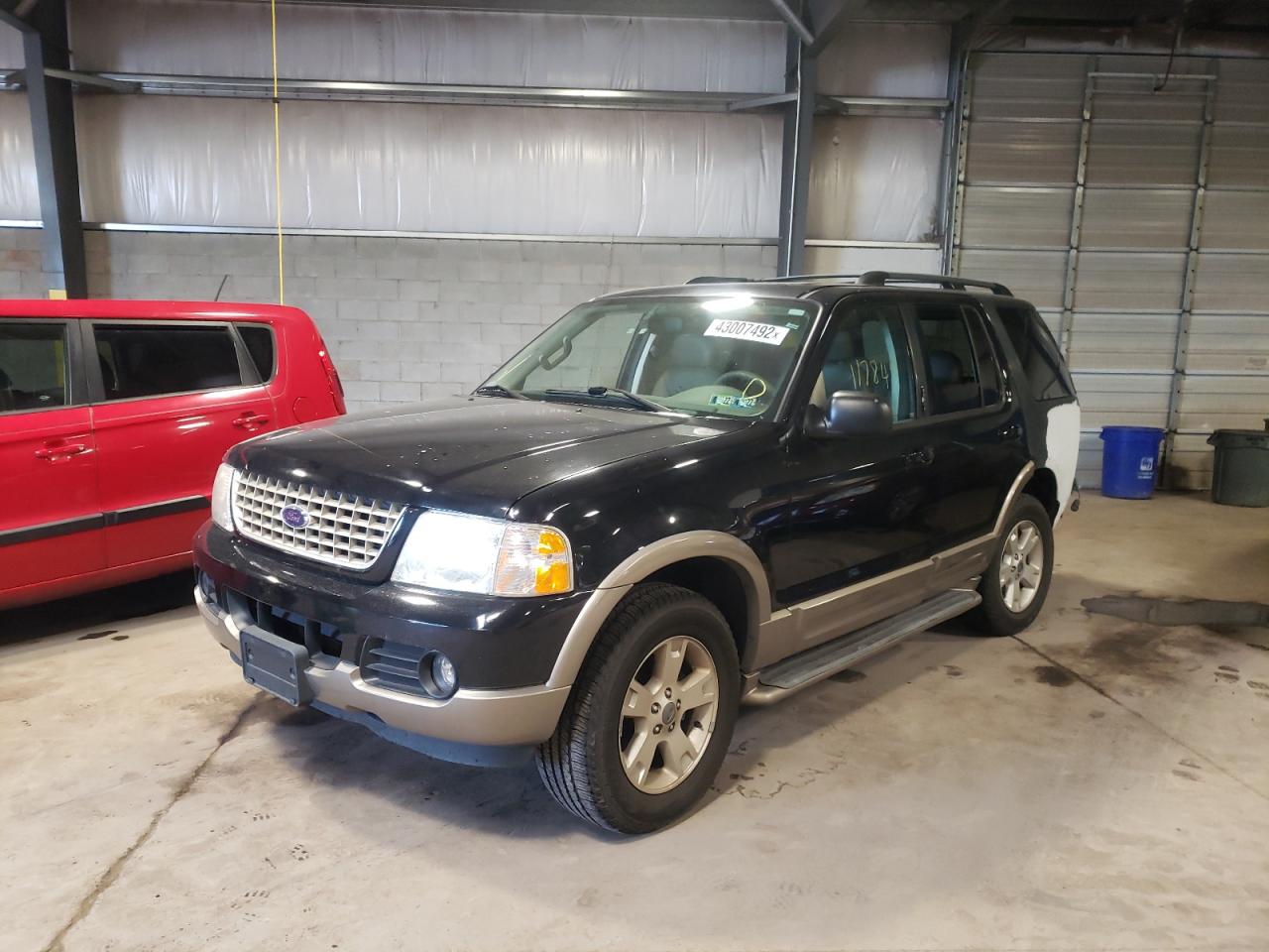 Photo 2 from auction – 2003 FORD EXPLORER E with VIN 1FMDU74WX3UB76558