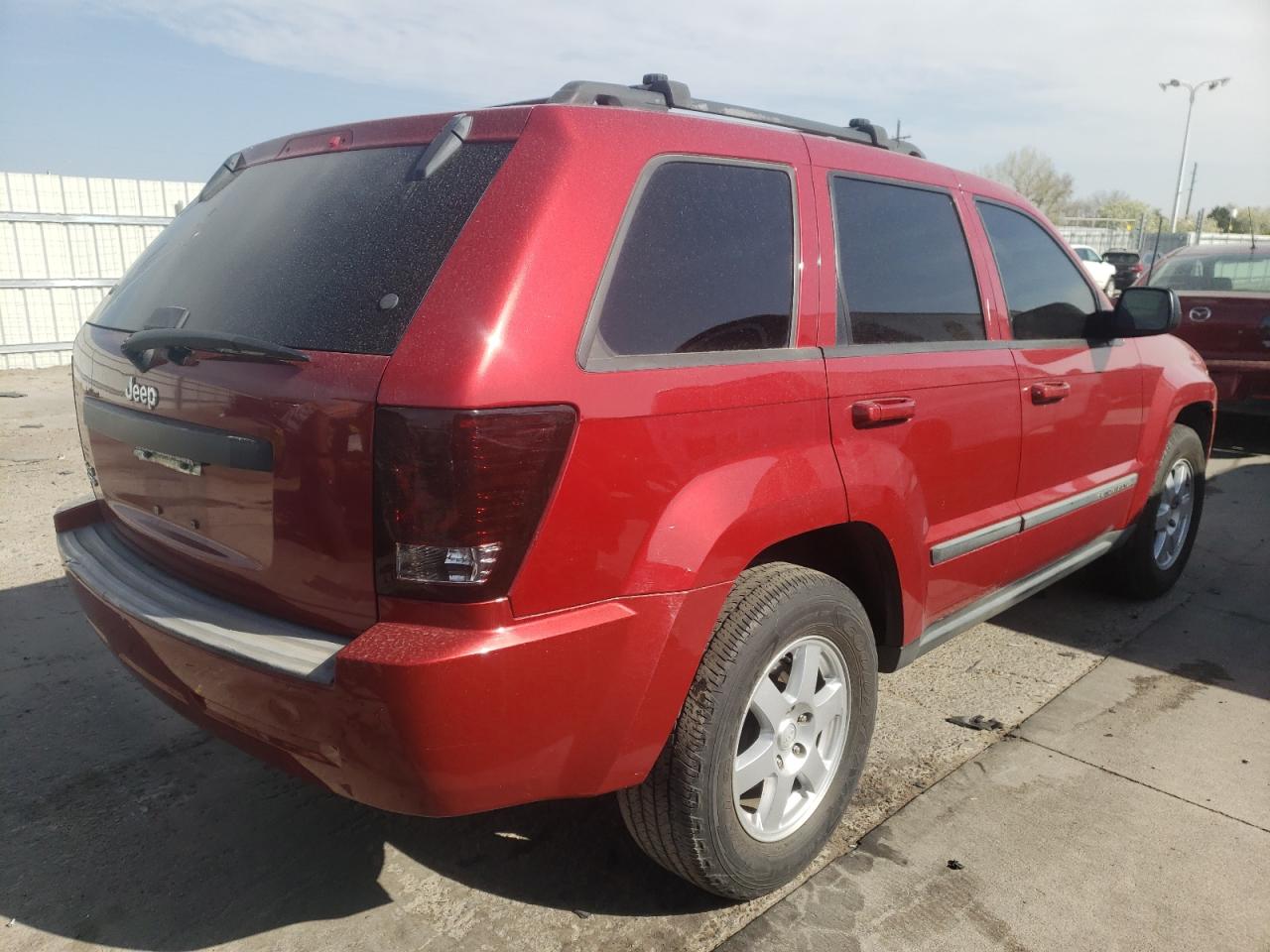 Photo 4 from auction – 2009 JEEP GRAND CHER with VIN 1J8GR48K29C550158