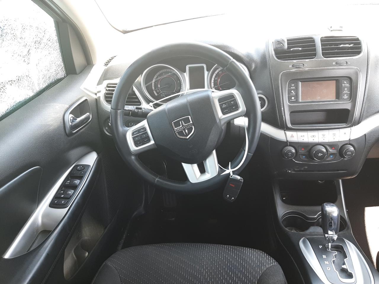 Photo 9 from auction – 2014 DODGE JOURNEY SE with VIN 3C4PDCAB4ET259038