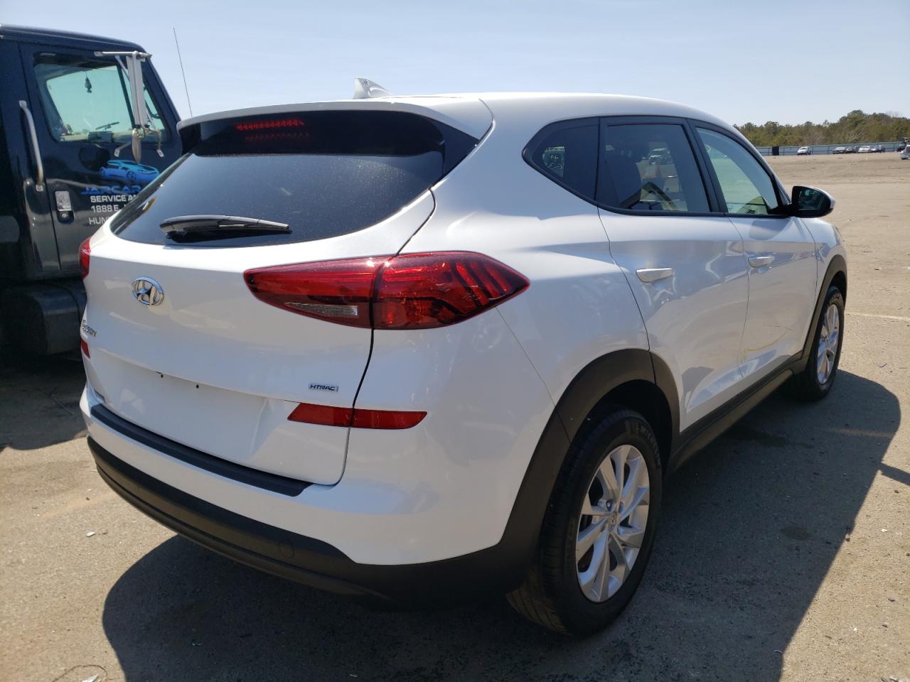 Photo 4 from auction – 2021 HYUNDAI TUCSON SE with VIN KM8J2CA45MU349635