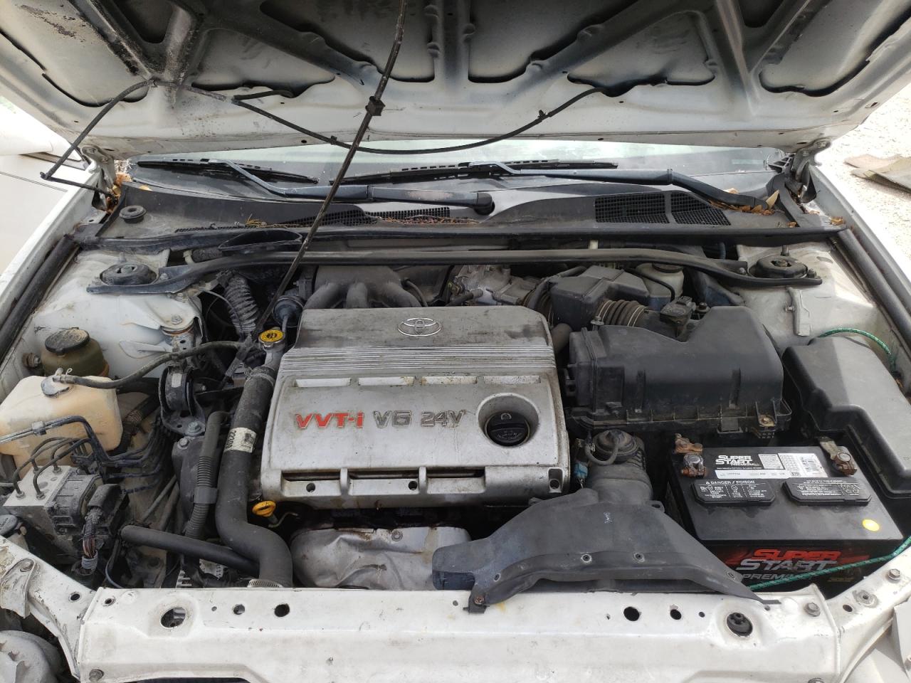 Photo 7 from auction – 2003 TOYOTA CAMRY LE with VIN 4T1BF32KX3U048931