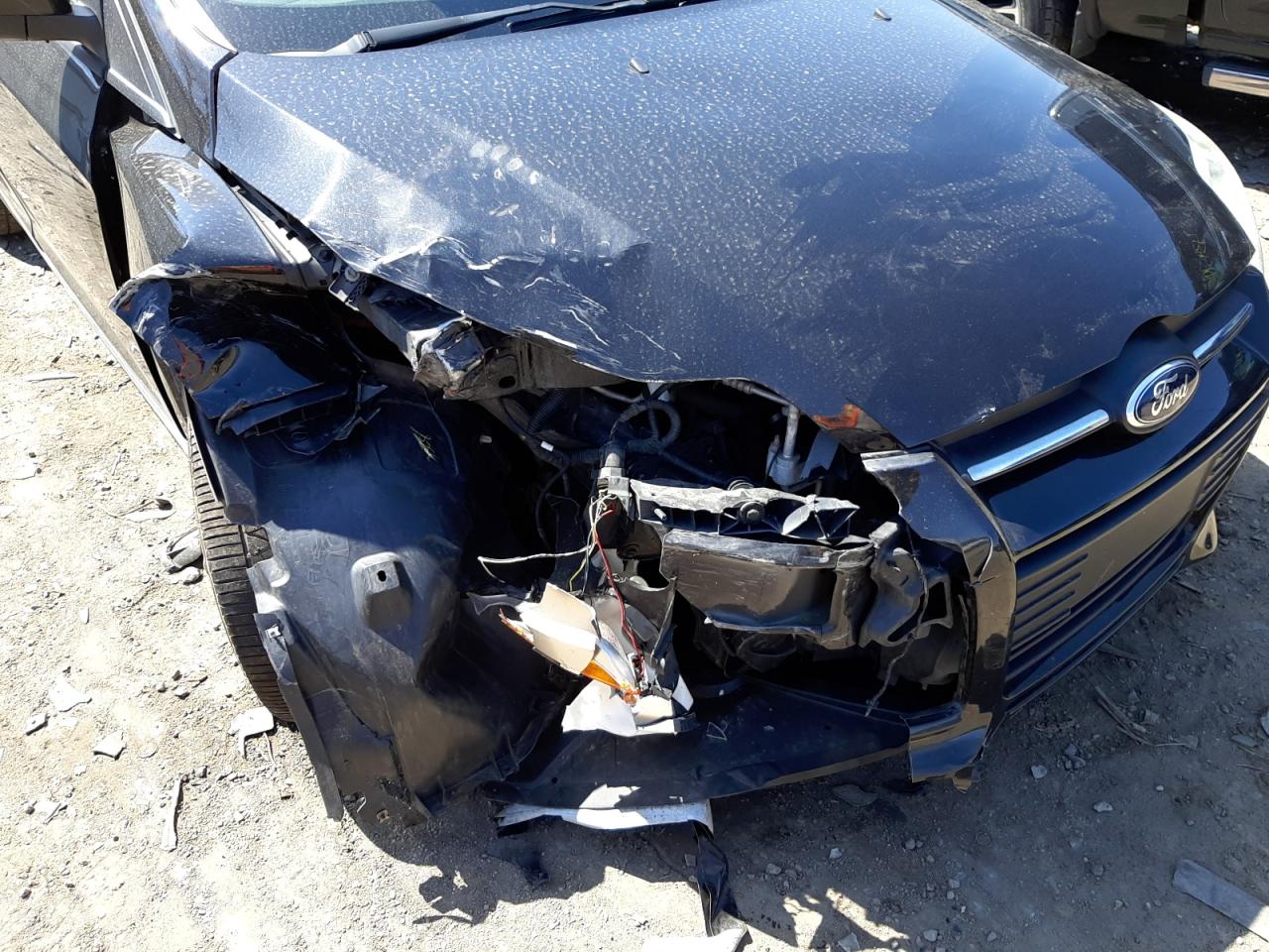 Photo 9 from auction – 2013 FORD FOCUS SE with VIN 1FADP3F20DL163099