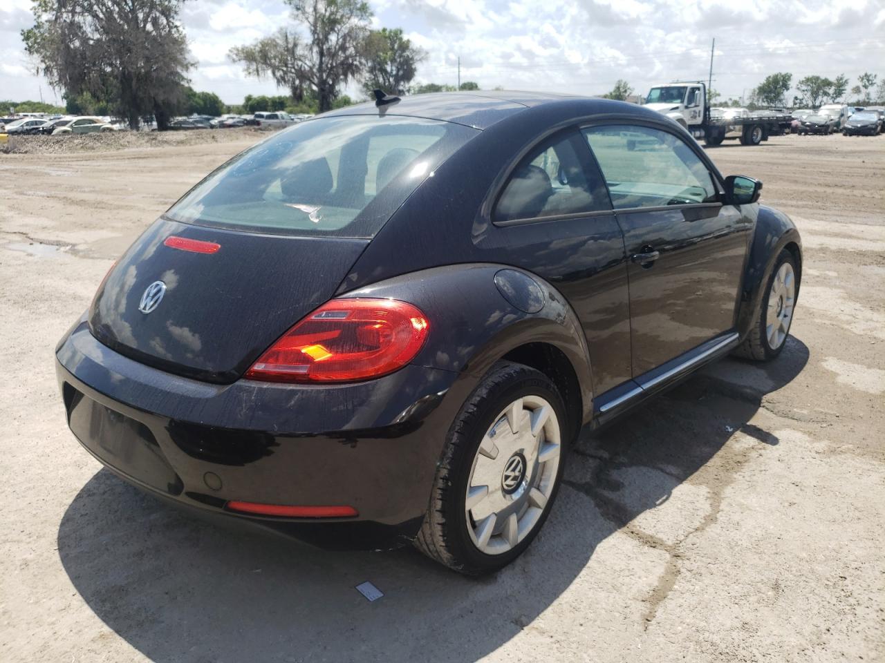 Photo 4 from auction – 2013 VOLKSWAGEN BEETLE with VIN 3VWJX7AT2DM683014