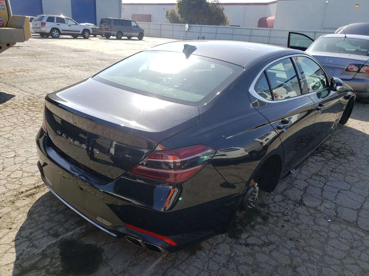 Photo 4 from auction – 2022 GENESIS G70 BASE with VIN KMTG34TA0NU093878