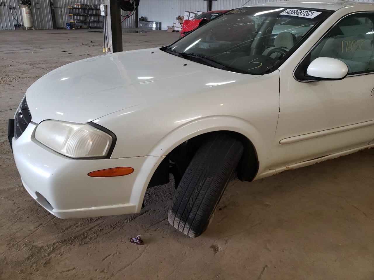Photo 9 from auction – 2000 NISSAN MAXIMA GLE with VIN JN1CA31D6YT546599