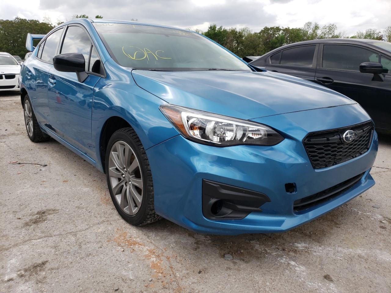 SUBARU IMPREZA 2017 with VIN 4S3GKAA60H1606857 - Photo from auction