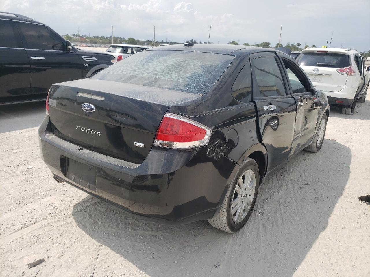 Photo 4 from auction – 2011 FORD FOCUS SEL with VIN 1FAHP3HN3BW135320
