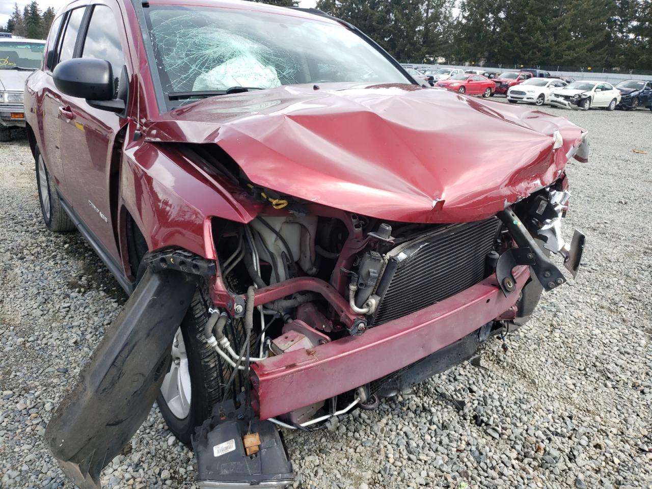 Photo 9 from auction – 2012 JEEP COMPASS LA with VIN 1C4NJCEB8CD662873