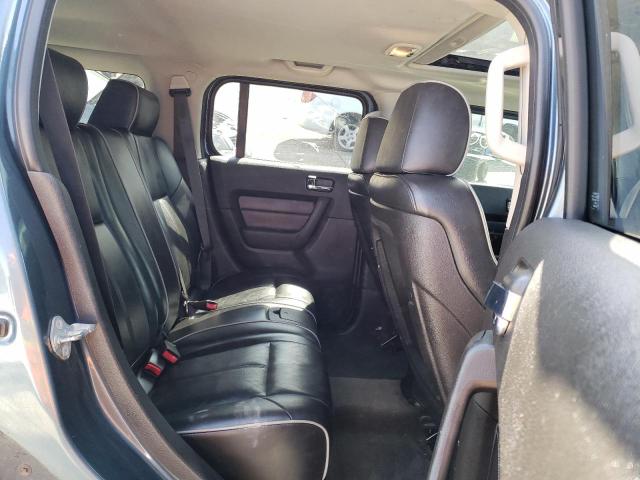 Photo 6 from auction – 2007 HUMMER H3 with VIN 5GTDN13EX78221125