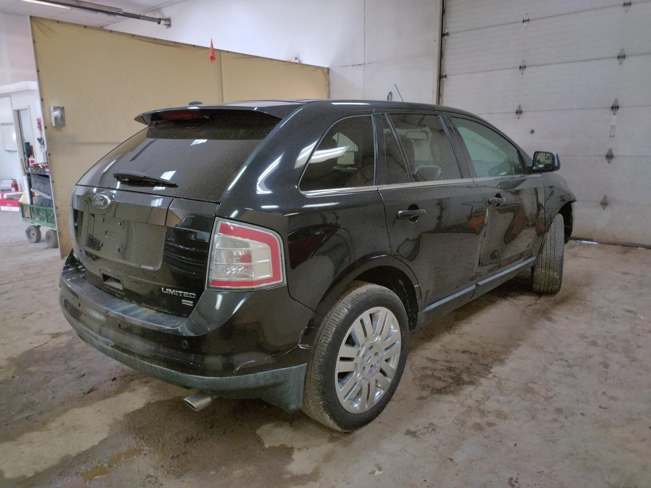 Photo 4 from auction – 2010 FORD EDGE LIMIT with VIN 2FMDK4KC7ABB44070