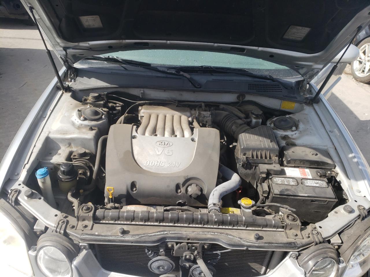 Photo 7 from auction – 2005 KIA OPTIMA with VIN KNAGD128655378231