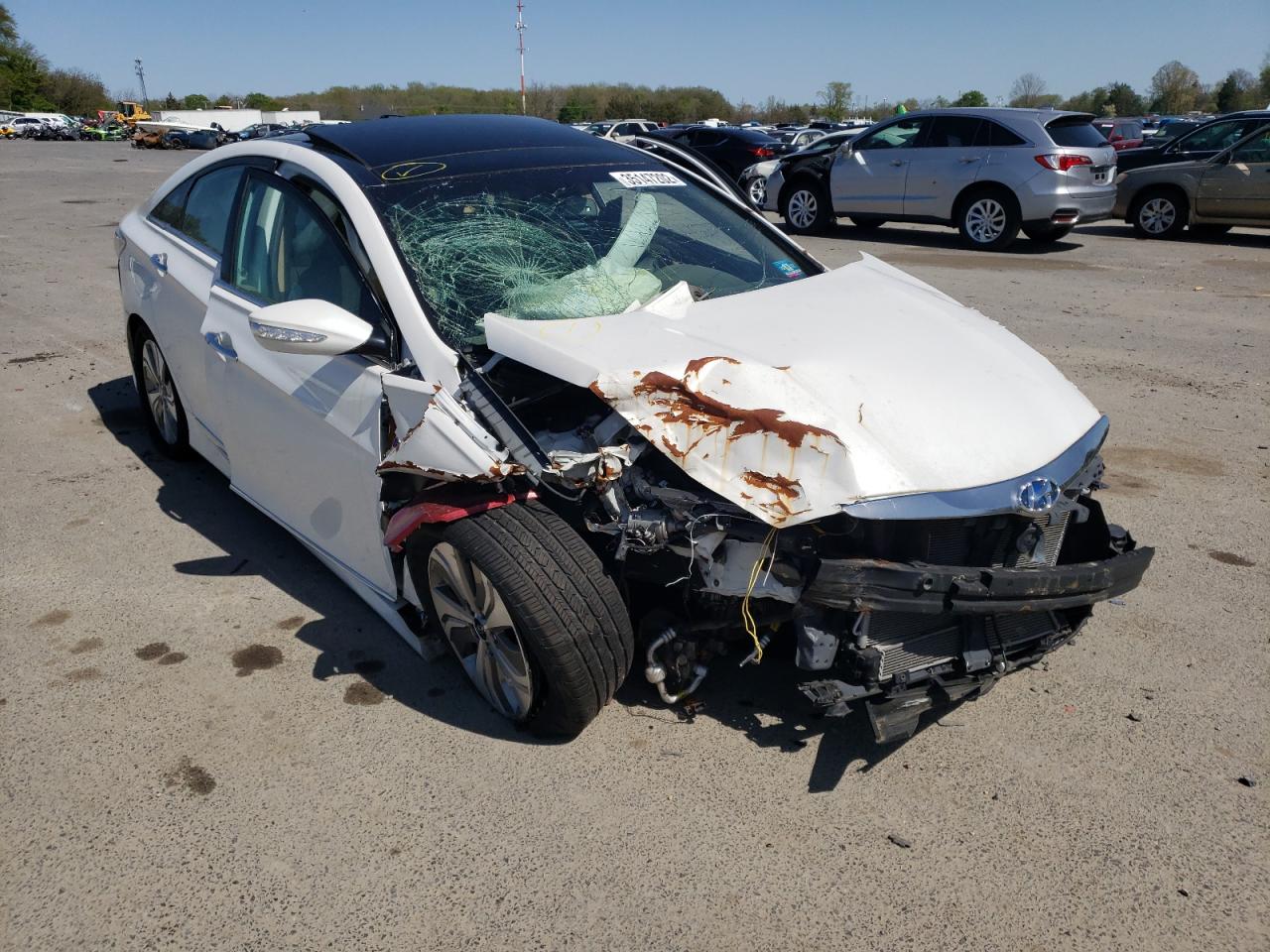 HYUNDAI SONATA HYB 2013 with VIN KMHEC4A45DA066710 - Photo from auction