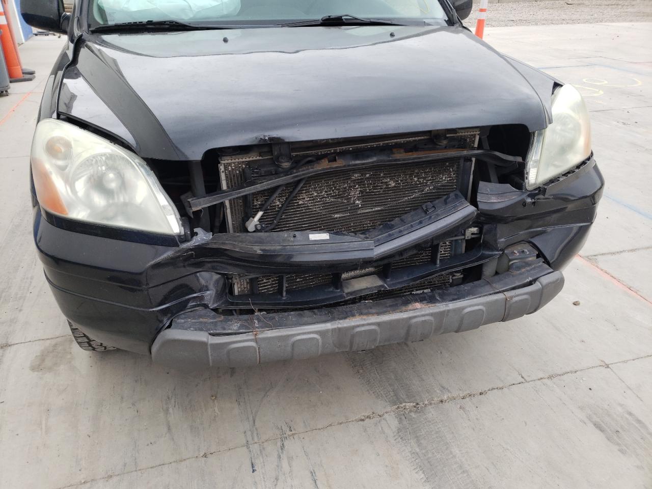 Photo 9 from auction – 2004 HONDA PILOT EX with VIN 2HKYF18464H552450