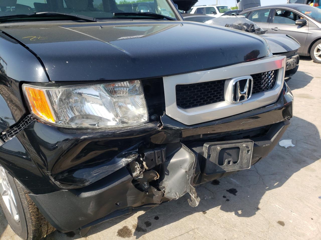 Photo 9 from auction – 2011 HONDA ELEMENT EX with VIN 5J6YH2H74BL005142