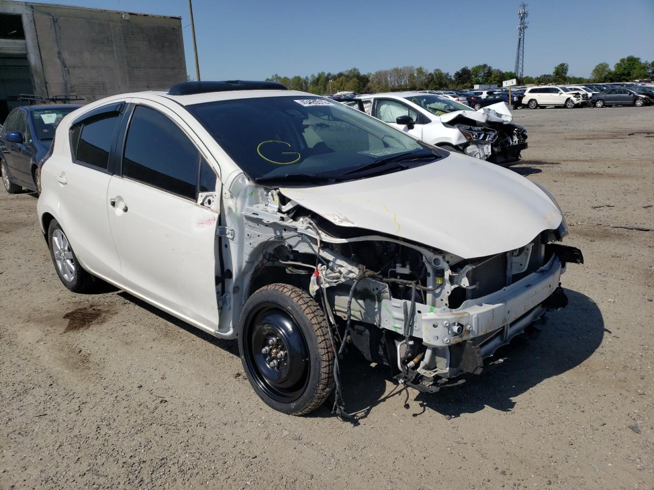 TOYOTA PRIUS C 2017 with VIN JTDKDTB31H1593119 - Photo from auction