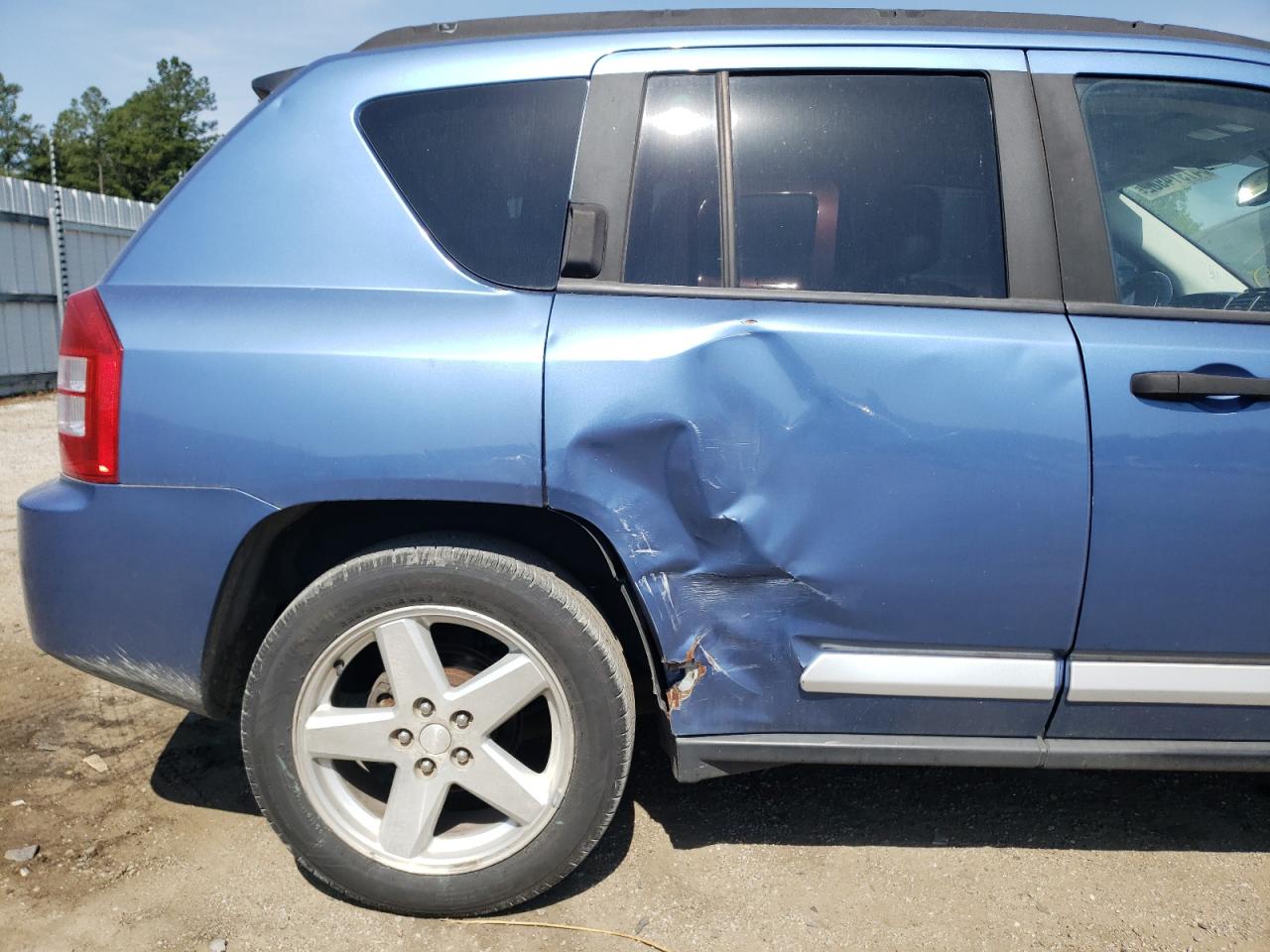 Photo 9 from auction – 2007 JEEP COMPASS LI with VIN 1J8FT57W77D176659