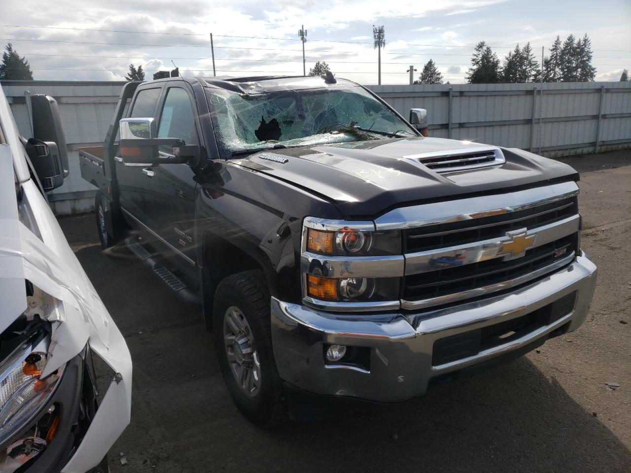 CHEVROLET SILVERADO 2018 with VIN 1GC1KWEY0JF214467 - Photo from auction