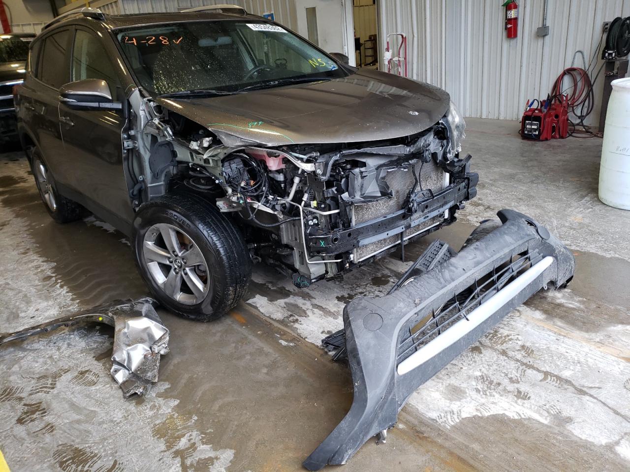 Photo 1 from auction – 2015 TOYOTA RAV4 XLE with VIN JTMWFREV1FD071601