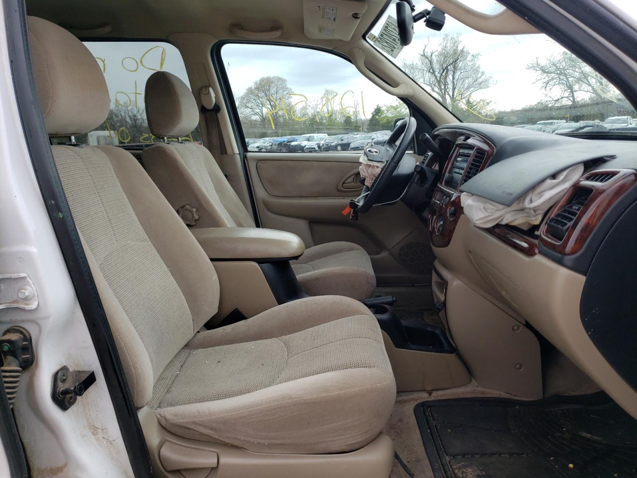 Photo 5 from auction – 2004 MAZDA TRIBUTE LX with VIN 4F2YZ04124KM22843