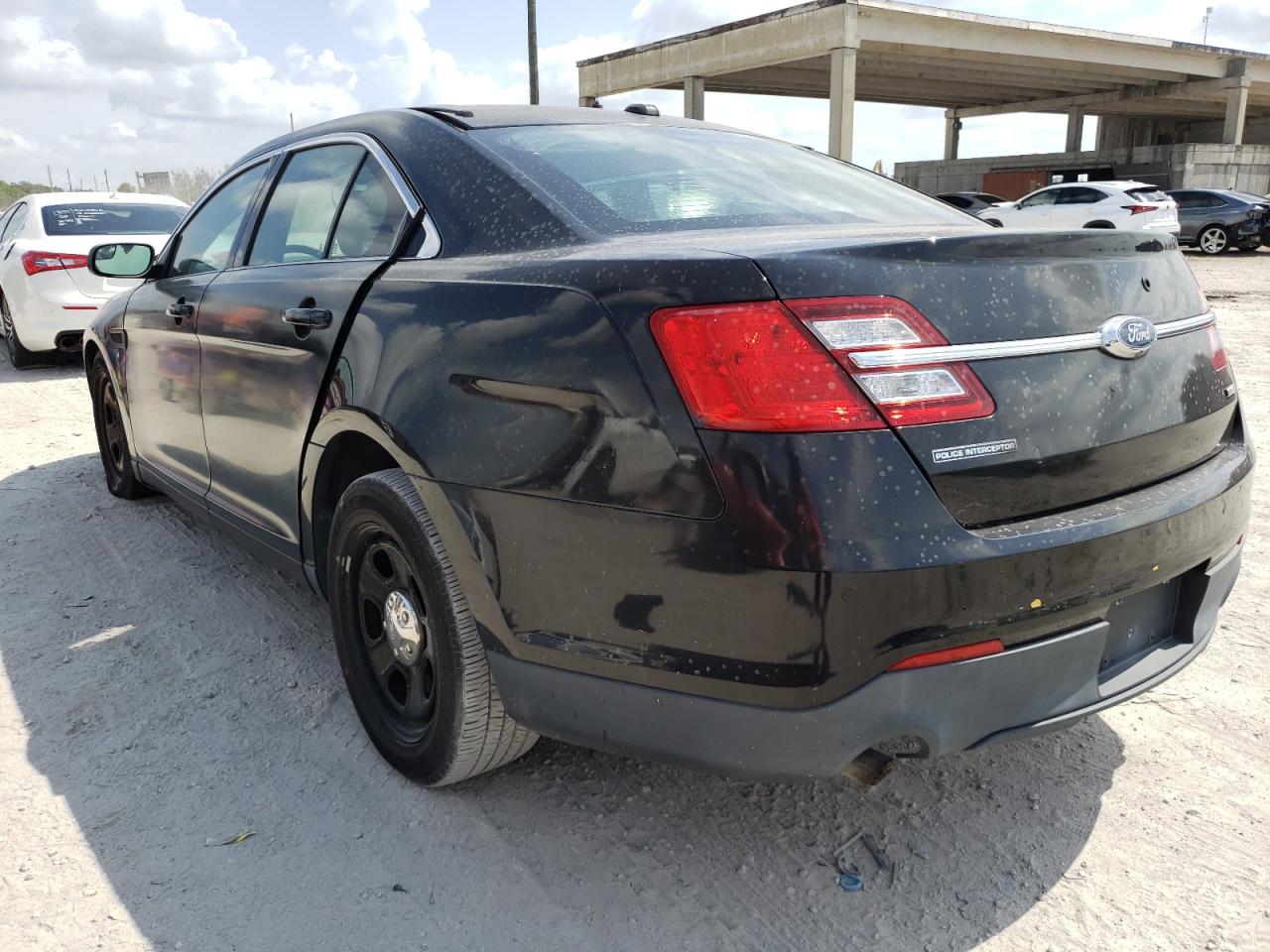Photo 3 from auction – 2016 FORD TAURUS POL with VIN 1FAHP2MK4GG111762
