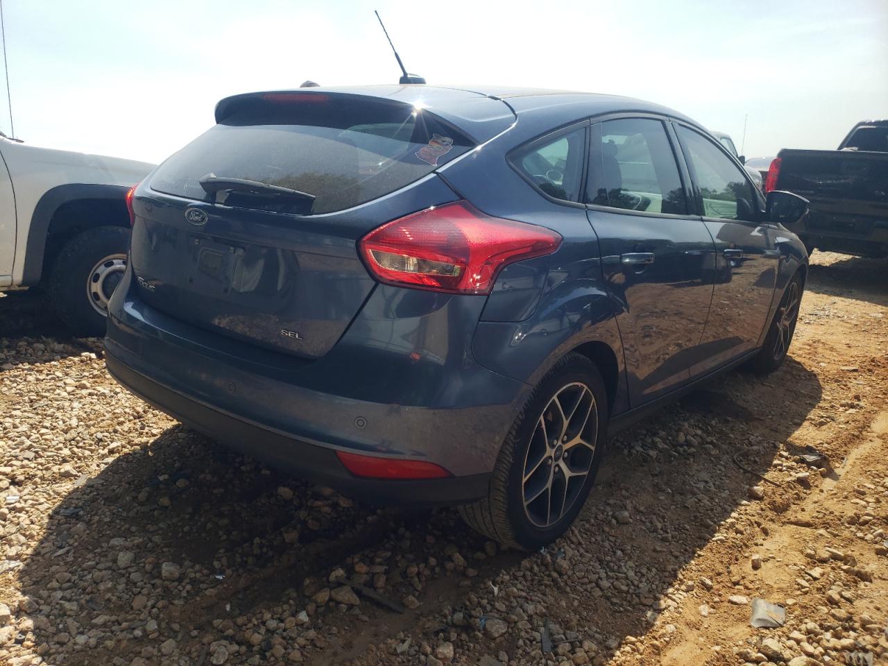 Photo 4 from auction – 2018 FORD FOCUS SEL with VIN 1FADP3M22JL223737
