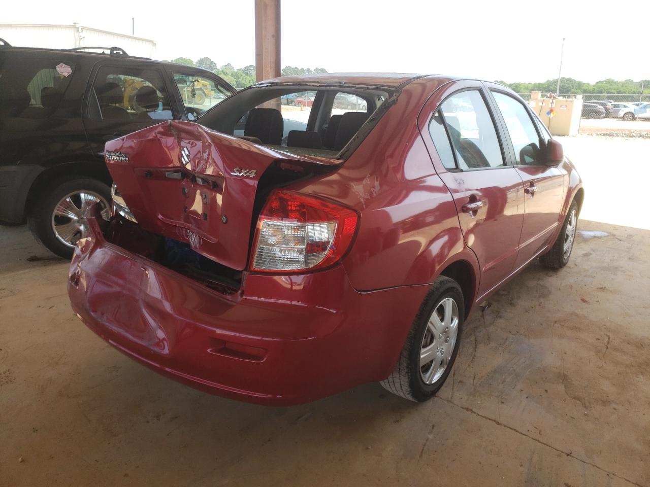 Photo 4 from auction – 2012 SUZUKI SX4 LE with VIN JS2YC5A30C6300483