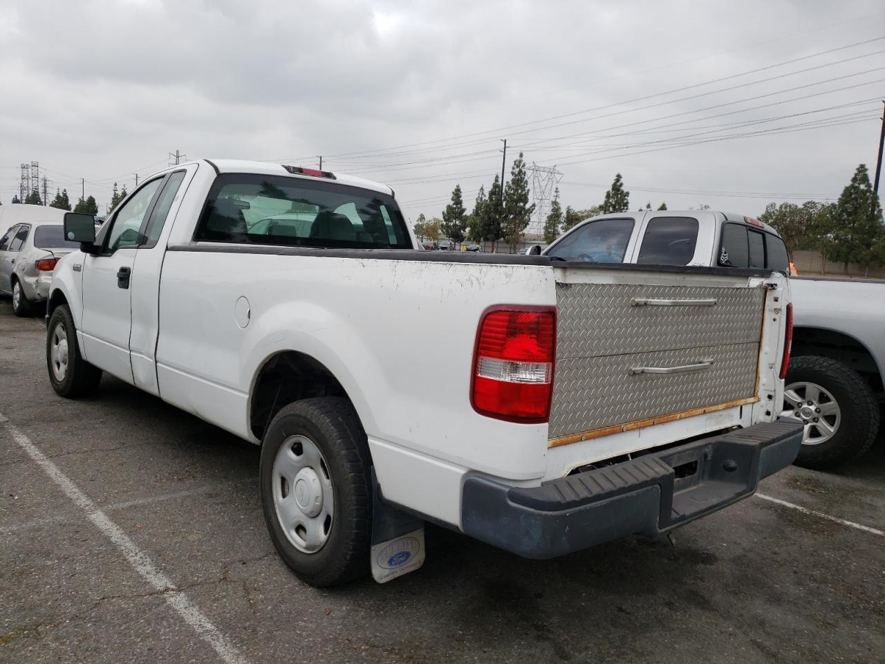 Photo 3 from auction – 2006 FORD F150 with VIN 1FTRF12266NA97839