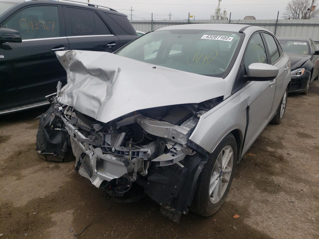 Photo 2 from auction – 2018 FORD FOCUS SE with VIN 1FADP3F23JL291901