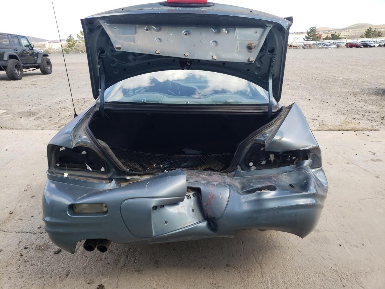 Photo 9 from auction – 2000 CHRYSLER SEBRING LX with VIN 4C3AU52N8YE096251