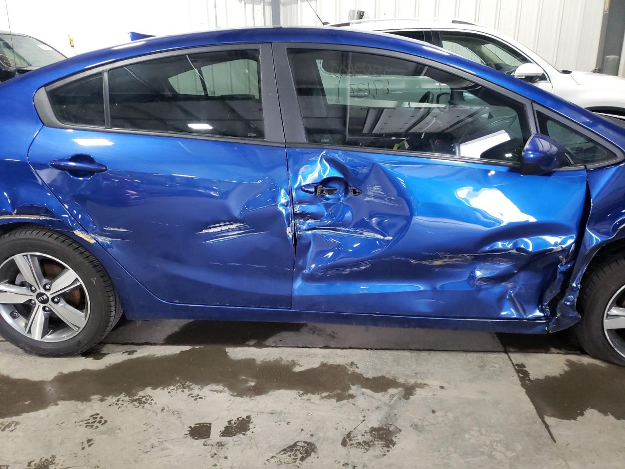Photo 9 from auction – 2018 KIA FORTE LX with VIN 3KPFL4A79JE273533
