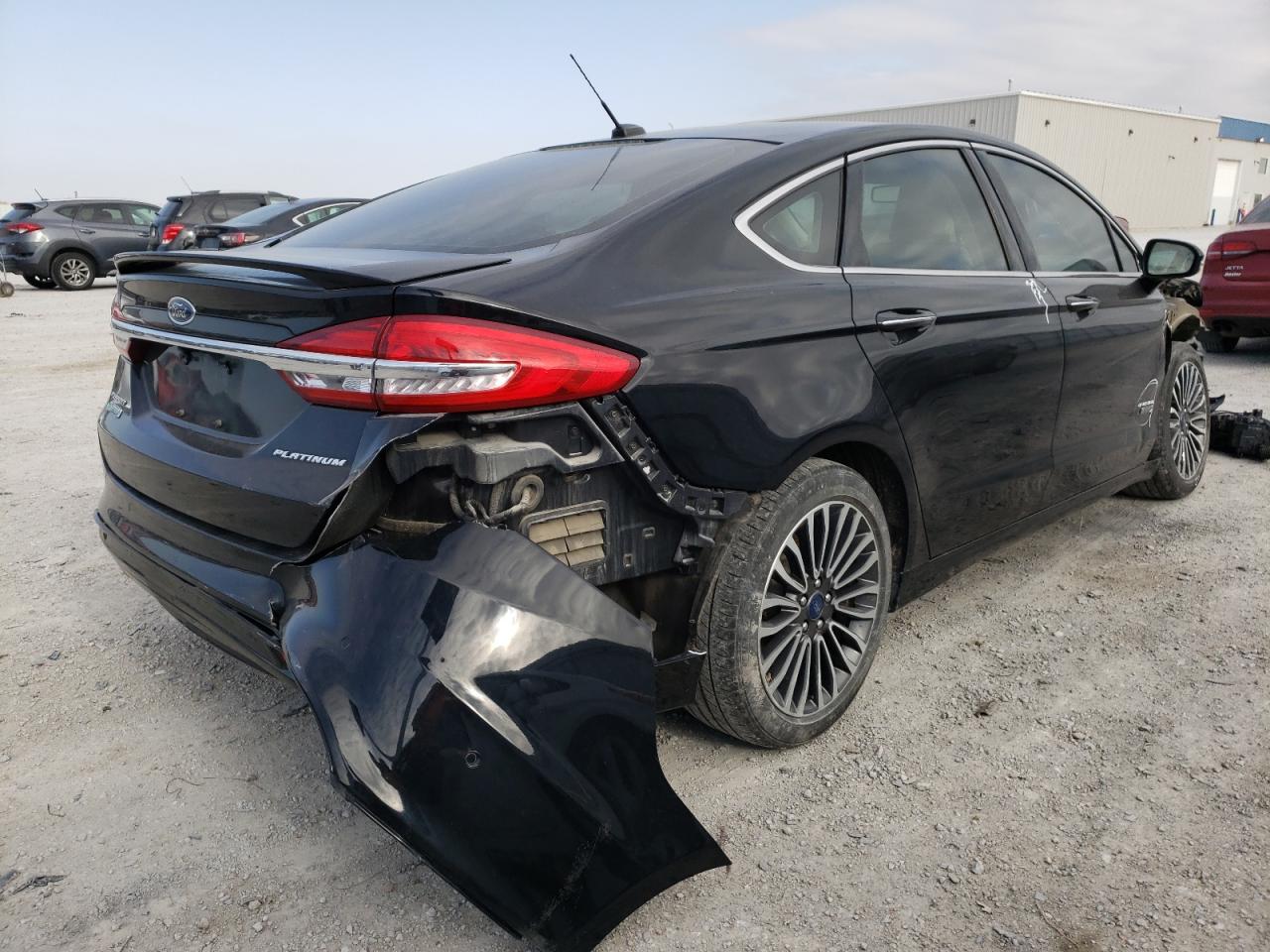 Photo 4 from auction – 2017 FORD FUSION TIT with VIN 3FA6P0SU2HR248015